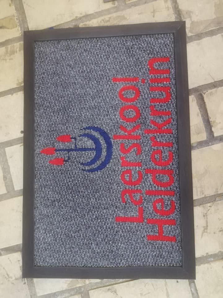 Title: Back To School – Enhancing Learning Spaces with Classroom Mats 2 LAERSKOOL HELDERKRUIN LOGO SCHOOL MAT