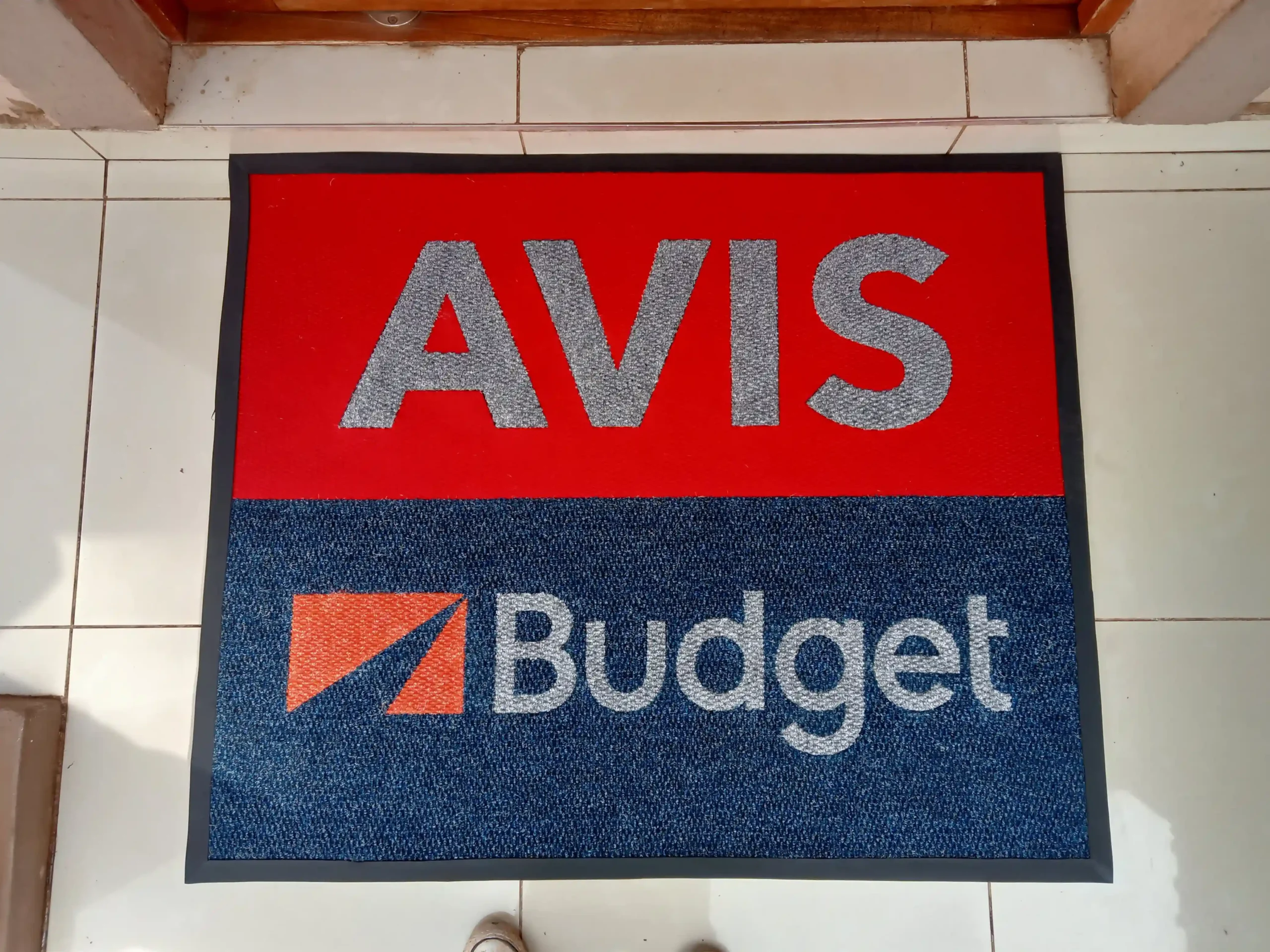 Branded mats with avis budget logo